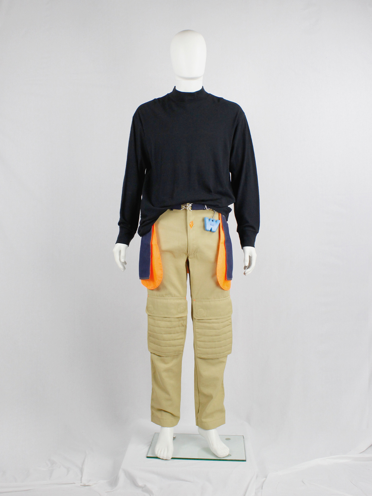 Walter Van Beirendonck W&LT denim trousers as a belt with neon 