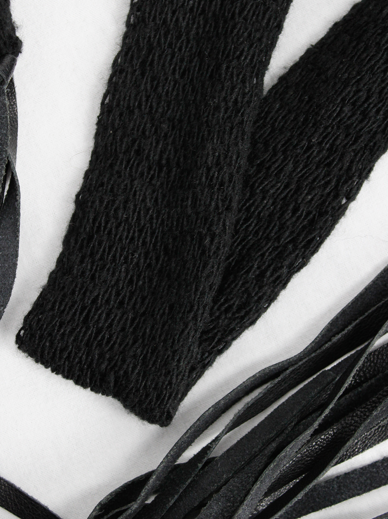 Ann Demeulemeester black long knit scarf with leather tassels