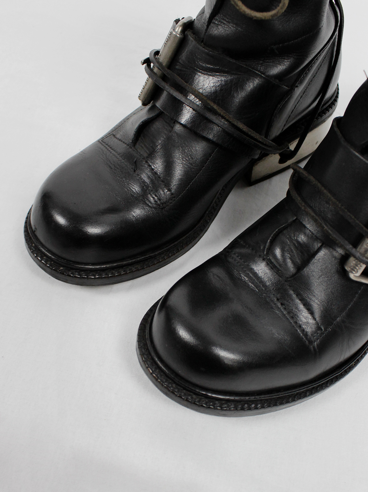 Dirk Bikkembergs black tall boots with belt and laces through the 