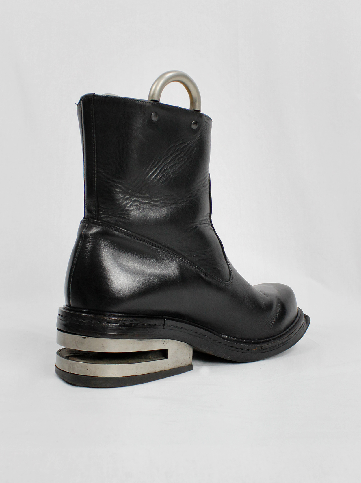 Dirk Bikkembergs black tall boots with metal slit heel and