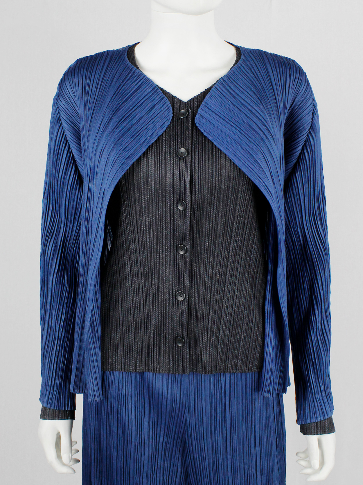 Issey Miyake Pleats Please bright blue cardigan with curved