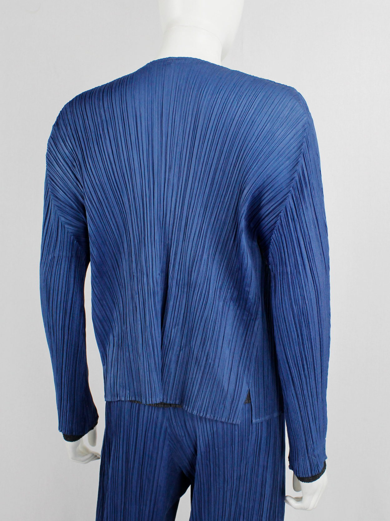 Issey Miyake Pleats Please bright blue cardigan with curved open