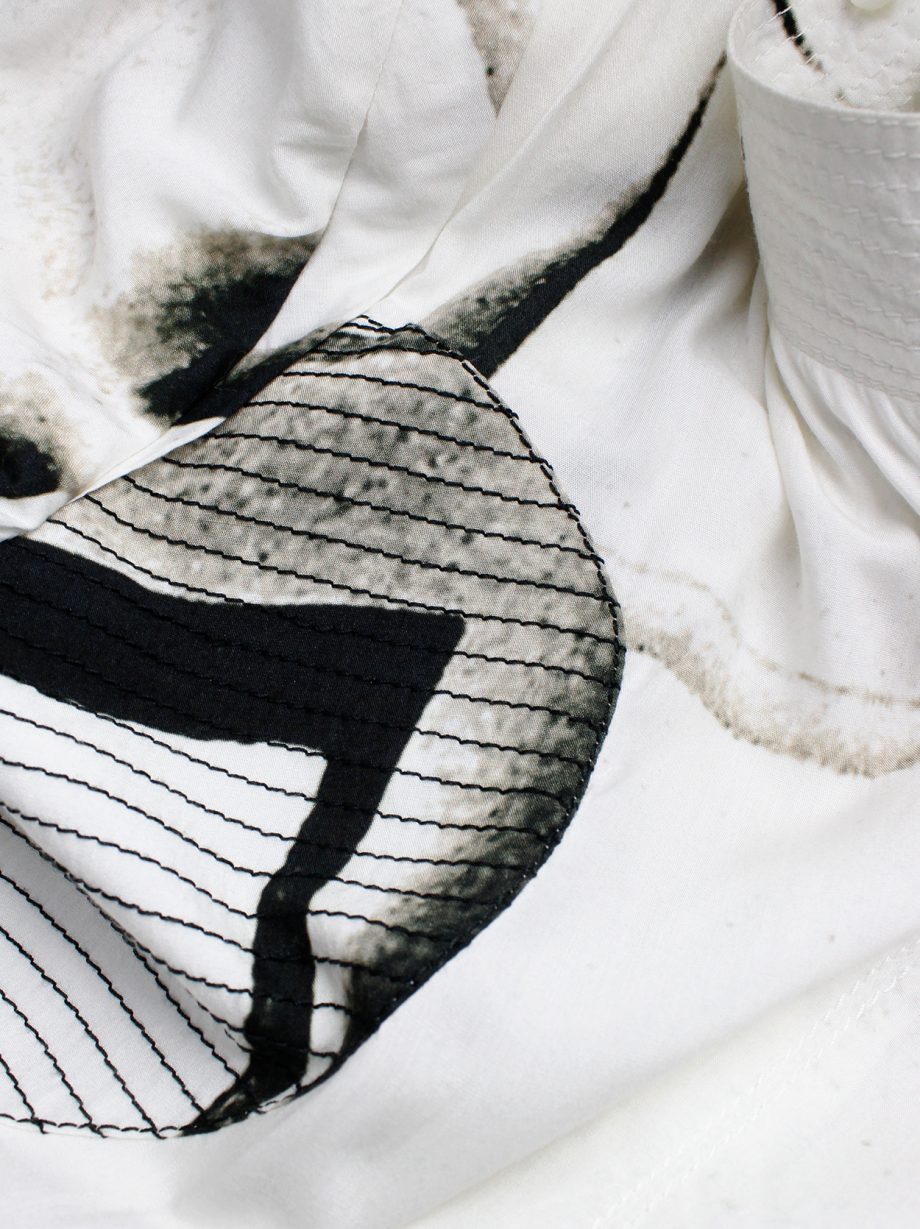 Ann Demeulemeester white buttoned fencing jacket with stitched panels spring 2011 (3)