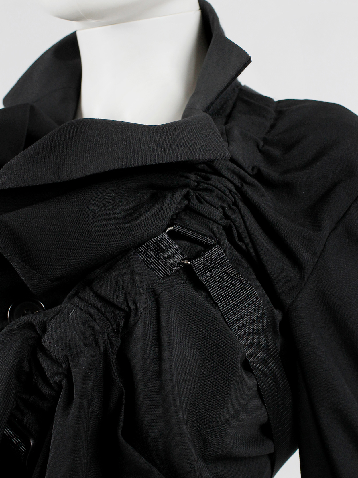 Junya Watanabe black parachute jacket with harness straps and open 