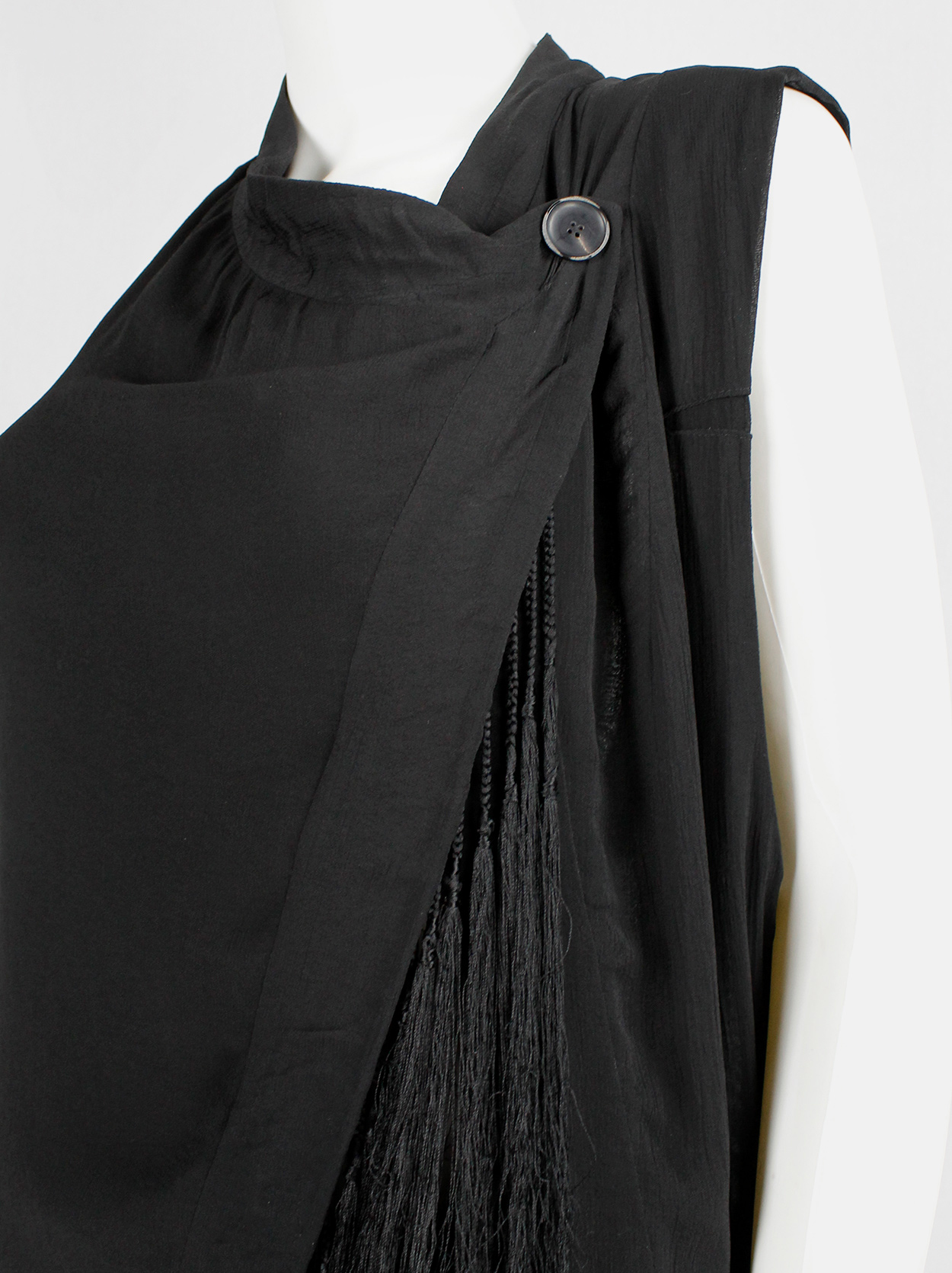 Ann Demeulemeester black long asymmetric vest with braided tassels