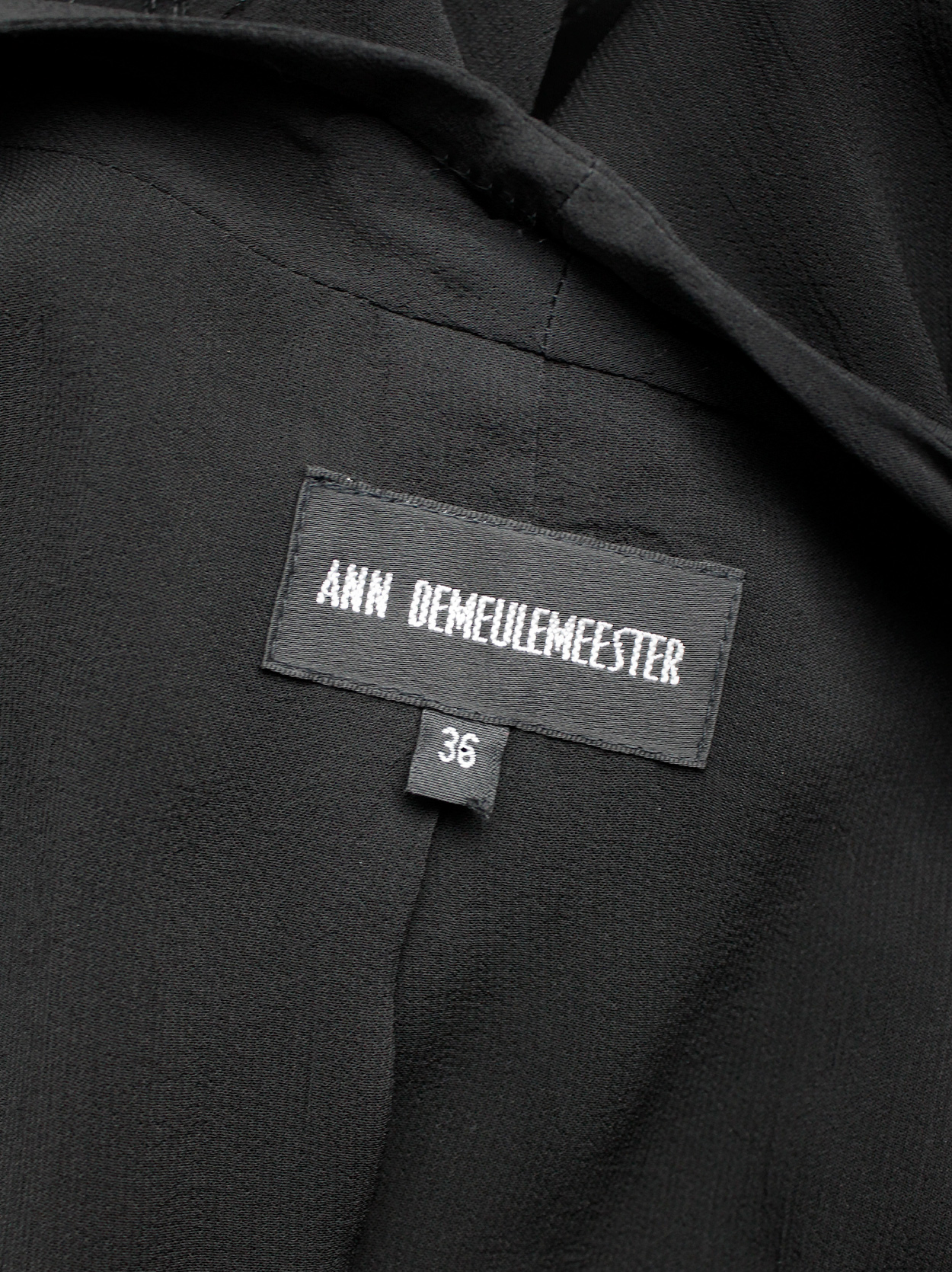 Ann Demeulemeester black long asymmetric vest with braided tassels