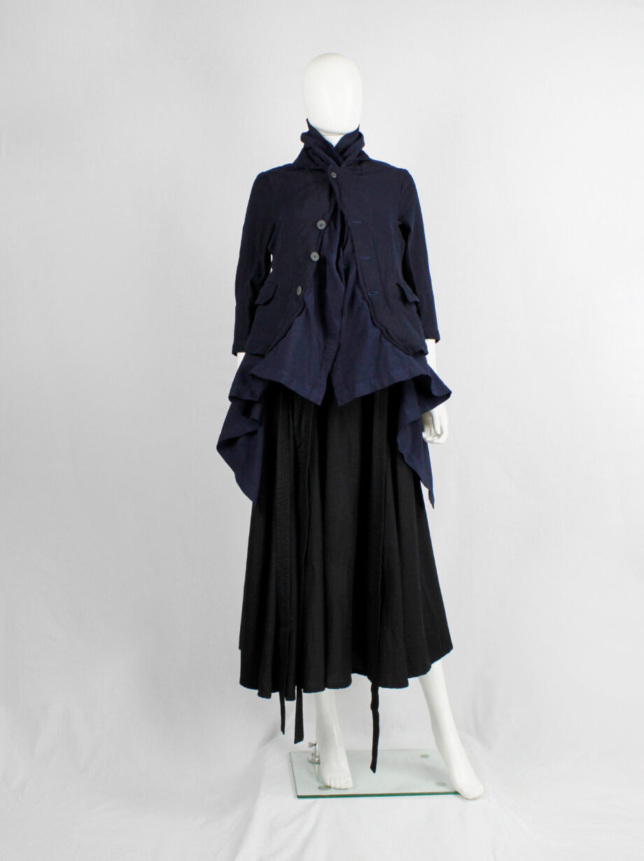 Comme des Garçons navy blazer fused with a long blue underlayer 