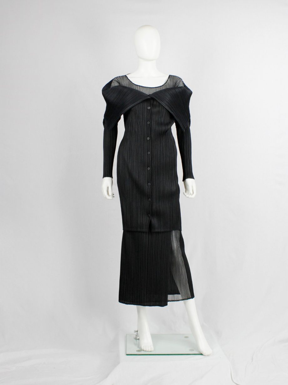 Issey Miyake Pleats Please black square jumper buttoned into a folded cardigan