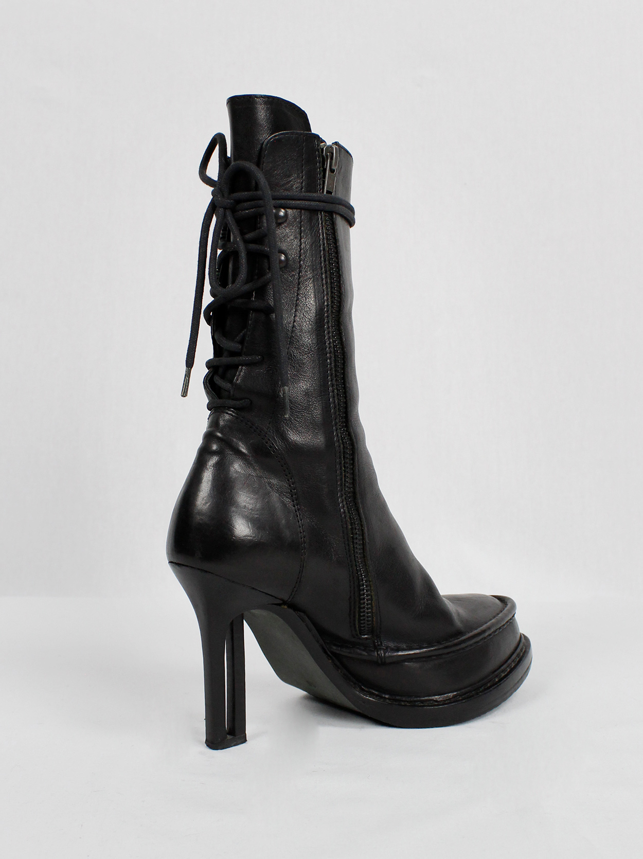 Ann Demeulemeester black boots with slit heel and backwards