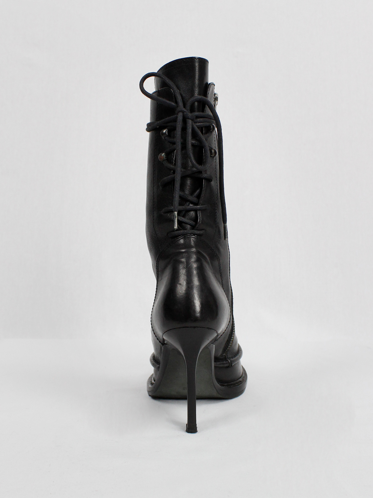 Ann Demeulemeester black boots with slit heel and backwards Ann Demeulemeester black boots with slit heel and backwards