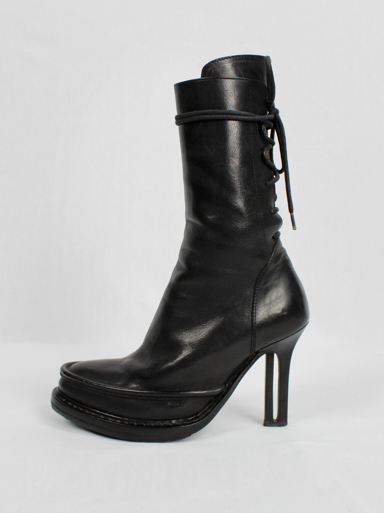 Ann Demeulemeester black boots with slit heel and backwards