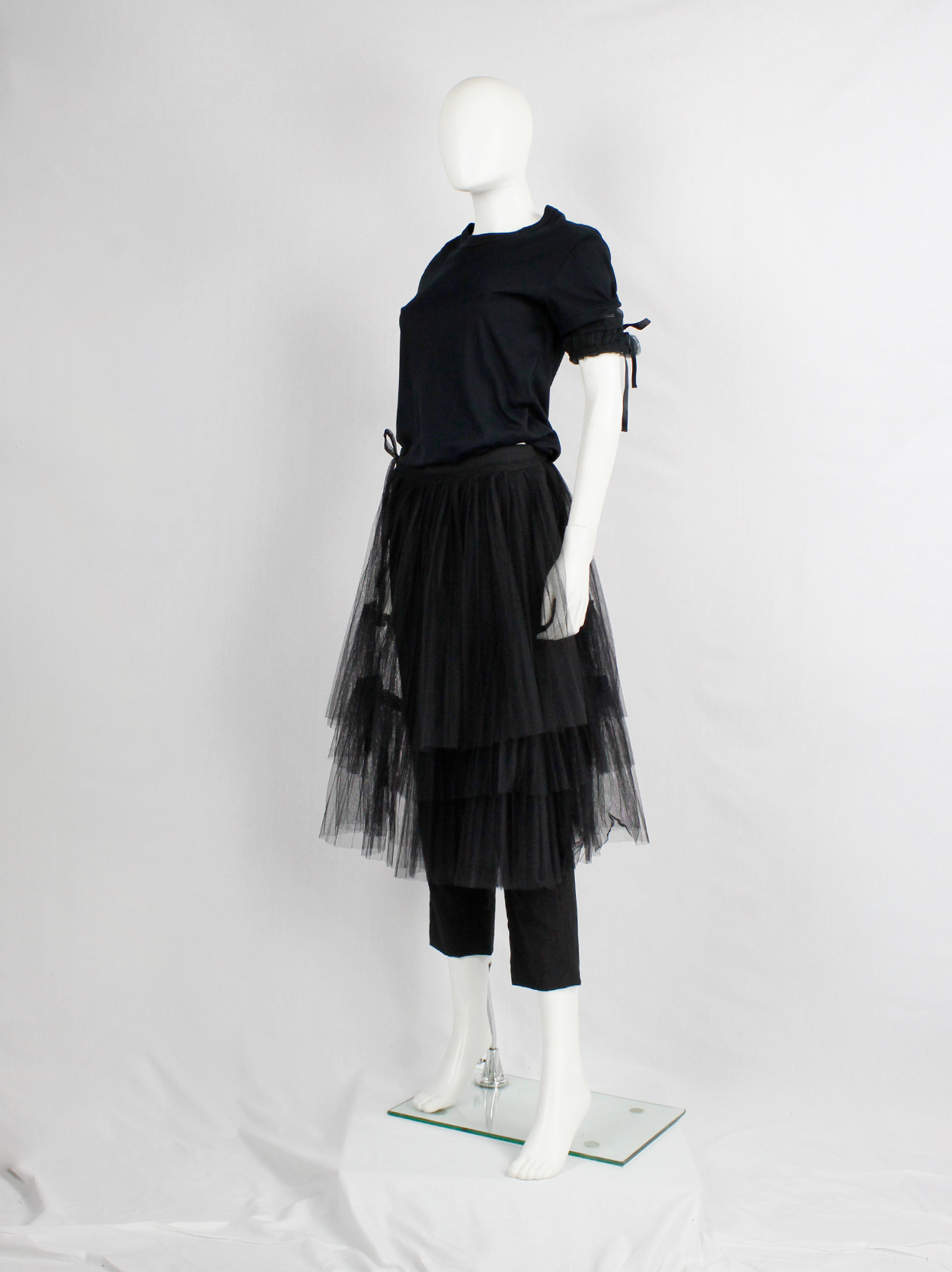 Comme des Garçons black trousers with tiered tulle half-skirt 