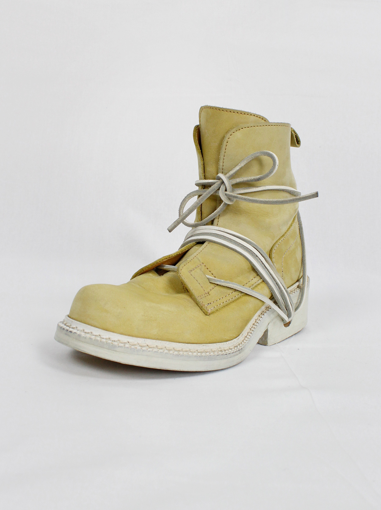Dirk Bikkembergs beige suede boots with white laces through the 