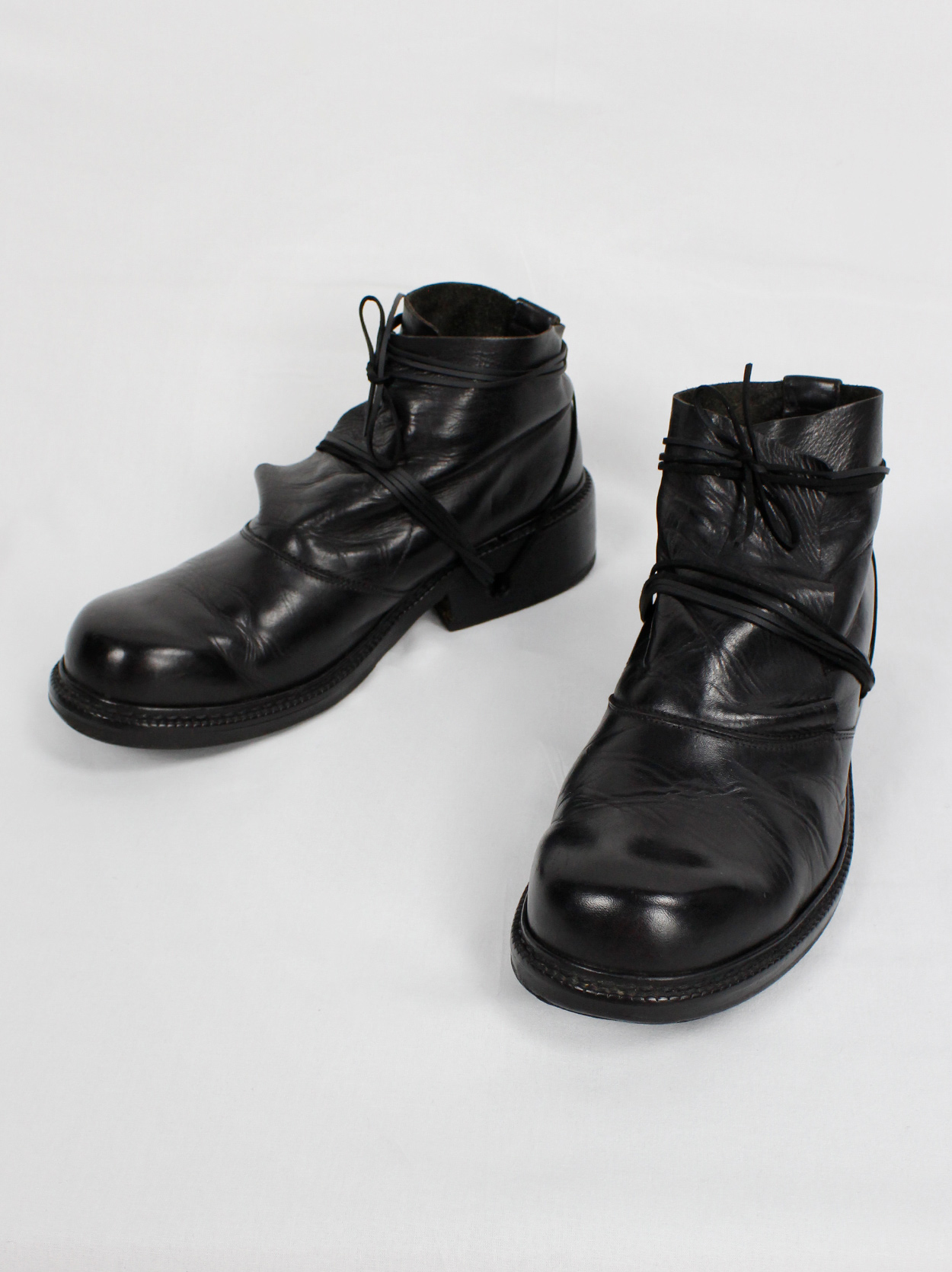 Dirk Bikkembergs black boots with flap and laces through the