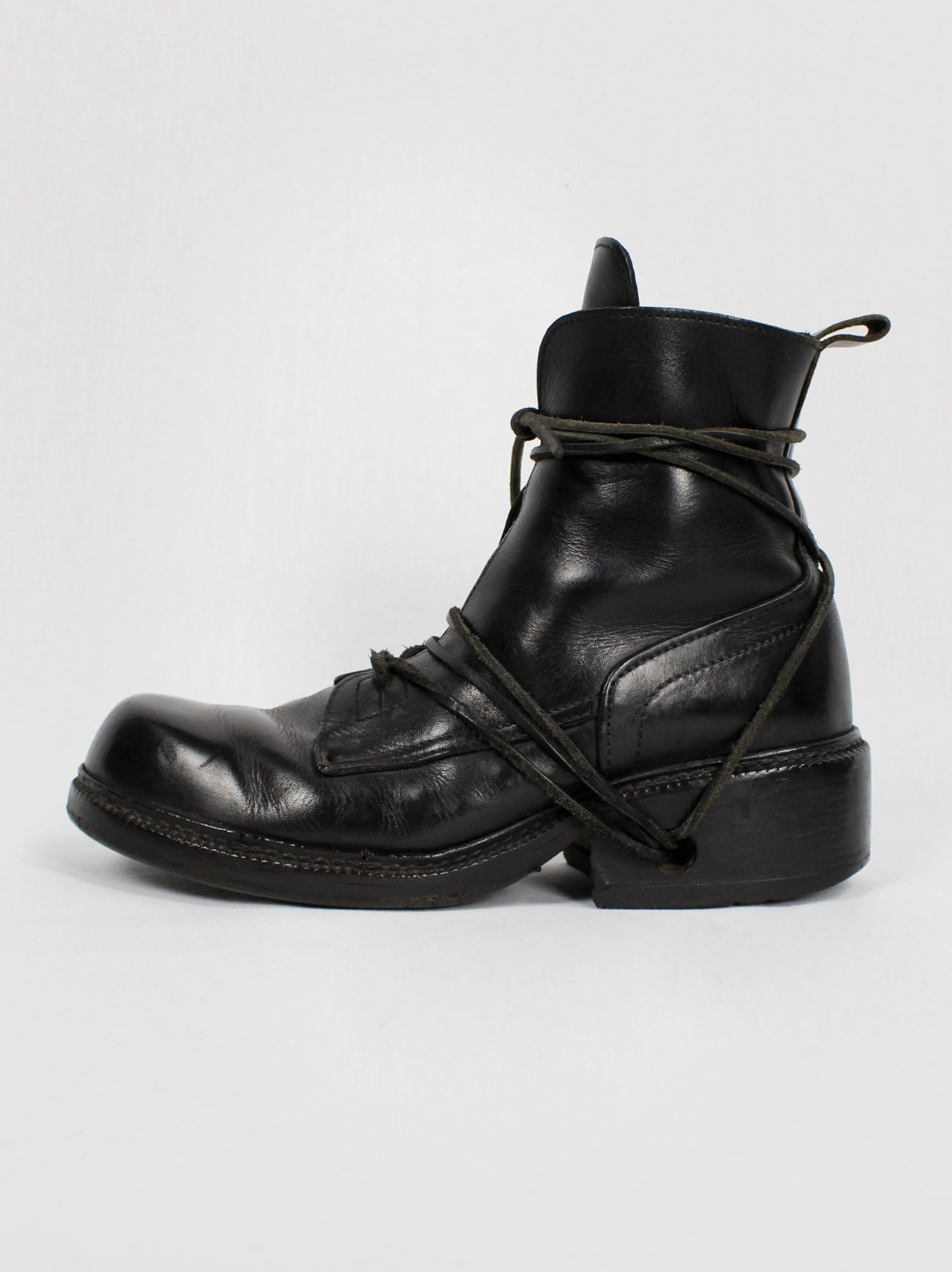 Dirk Bikkembergs black combat boots wrapped by laces through
