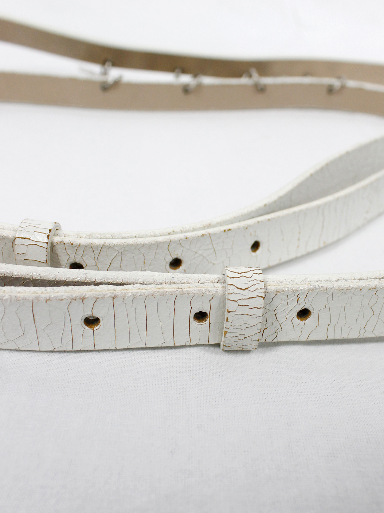 Ann Demeulemeester two white leather belts attached by metal LIFE