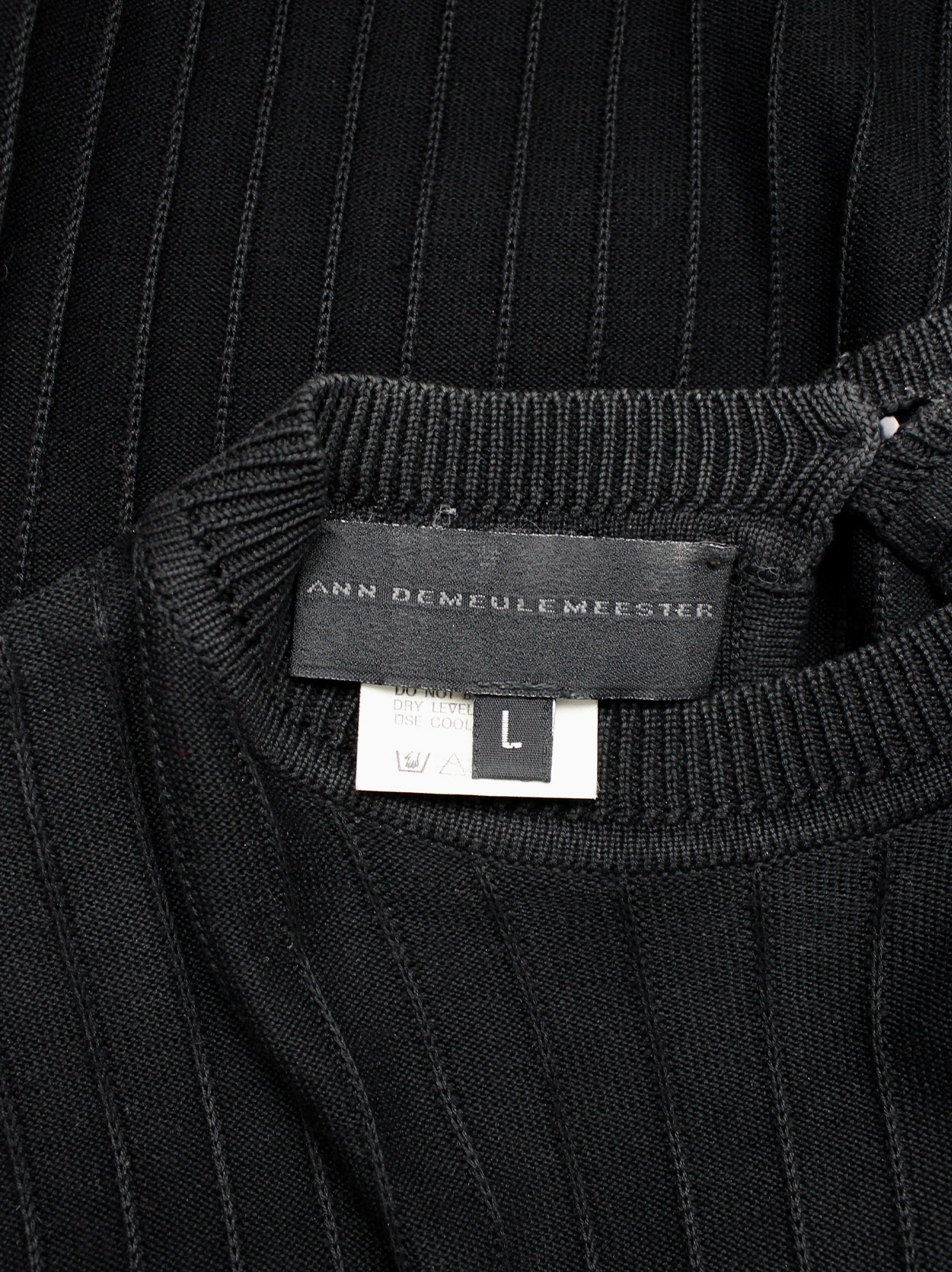 Ann Demeulemeester black knit top with ribbed pinstripe texture 