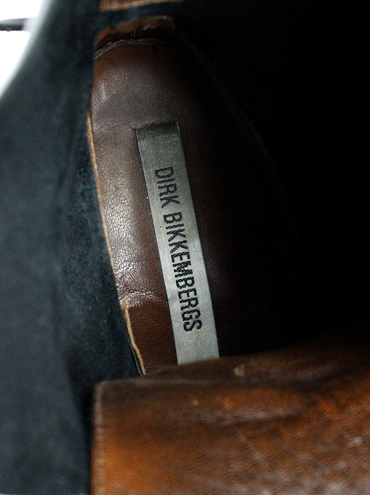 Dirk Bikkembergs black combat boots wrapped with laces through the