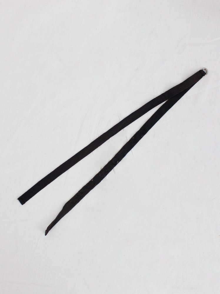 Ann Demeulemeester black ribbon accessory with 'eyes closed Ann Demeulemeester black ribbon accessory with 'eyes closed