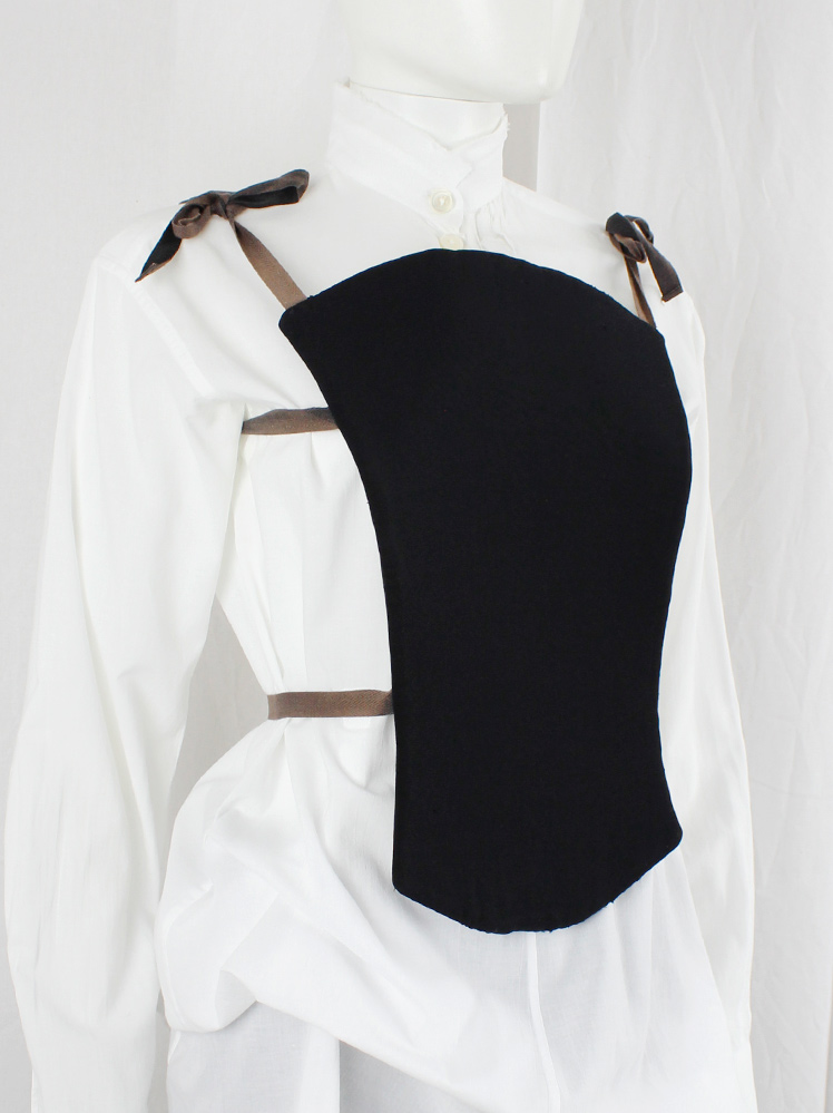 Dirk Van Saene black padded breastplate with brown ribbons — fall 