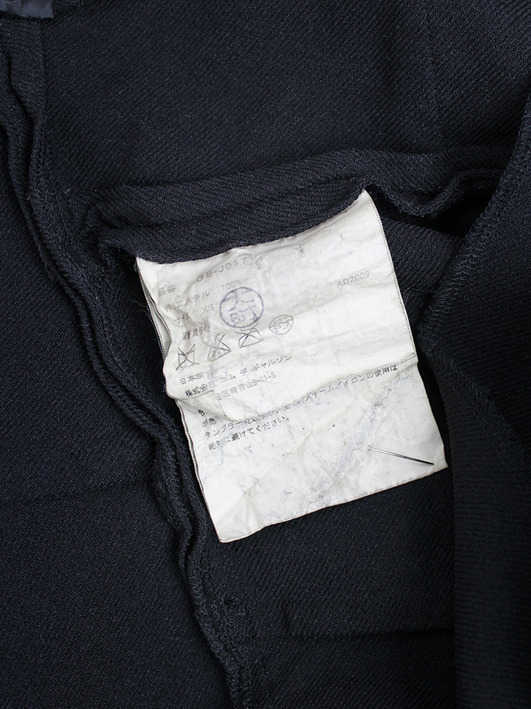 Comme des Garçons black cutaway tailcoat with triple layered Comme des Garçons black cutaway tailcoat with triple layered