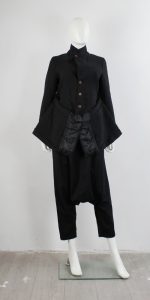 Black comme des garçons ジャンスカ Comme des Garçons black coat with open back and forwards folded