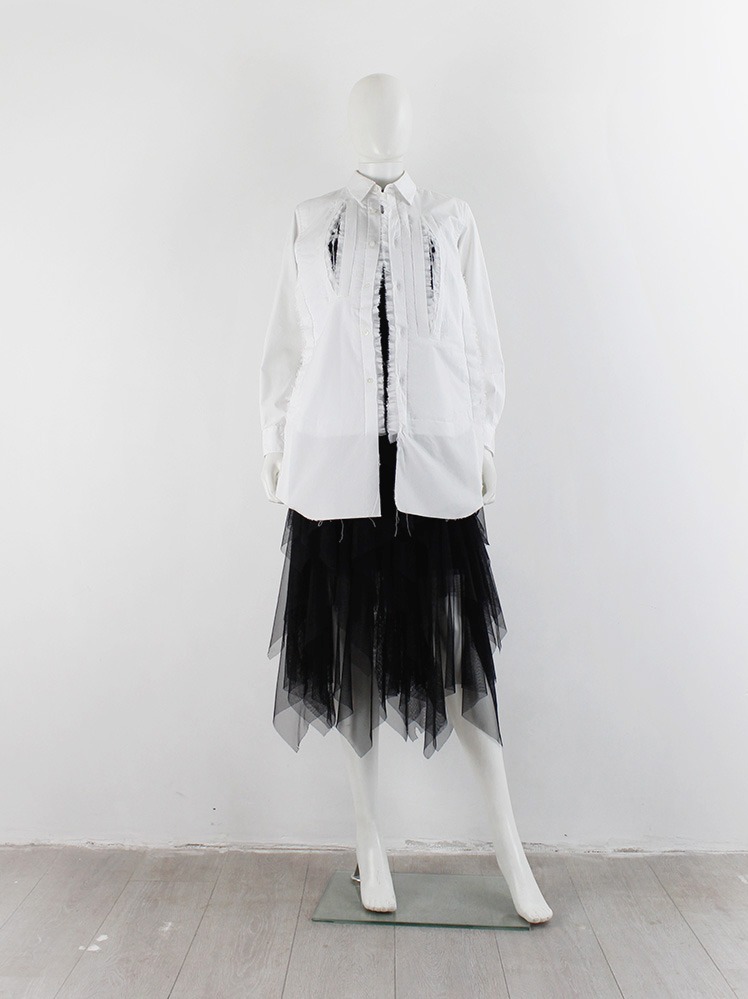 Comme des Garçons white shirt with vertical slits and ruffled