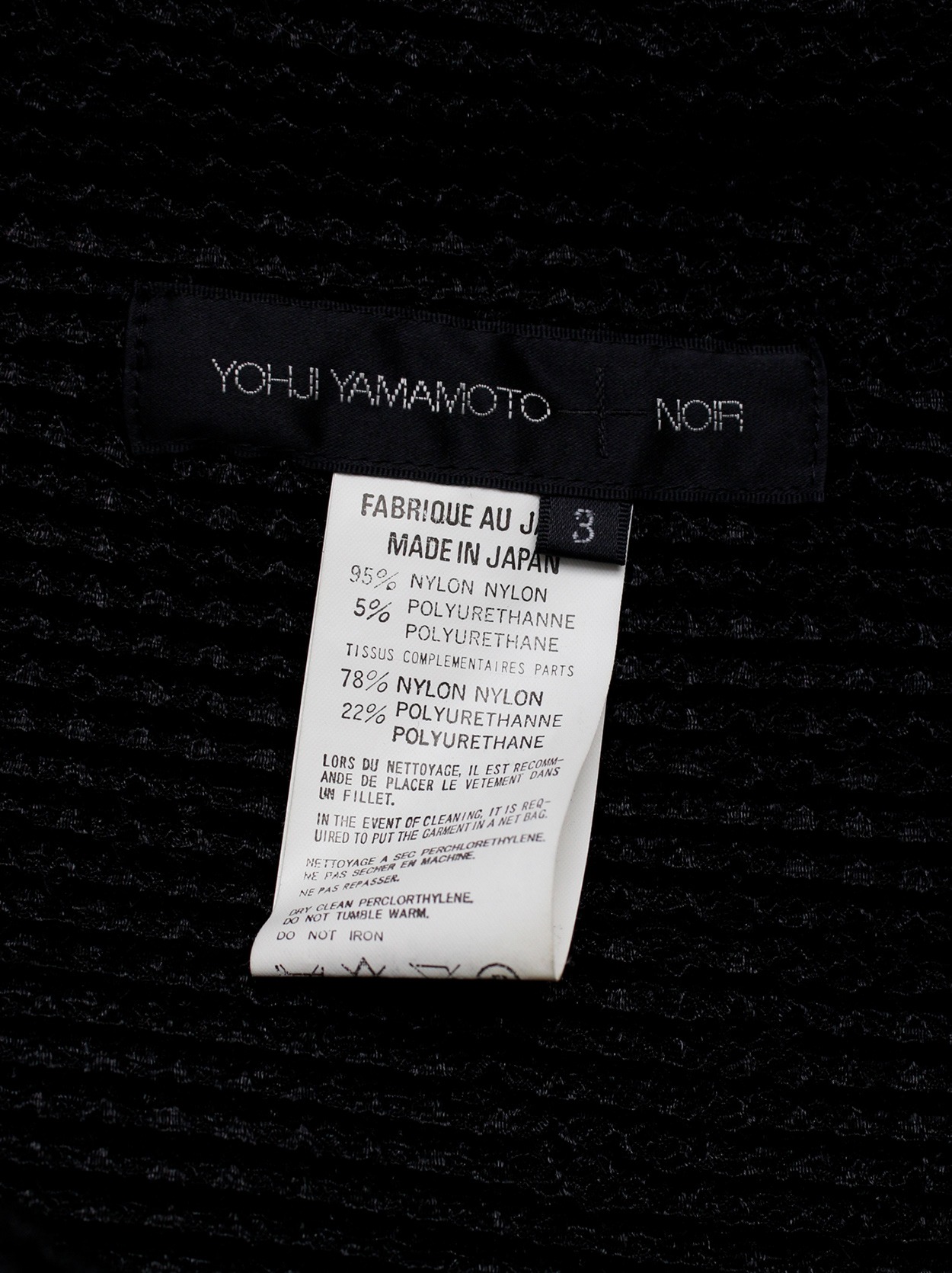 Yohji Yamamoto +Noir black bolero with woven front panels and 