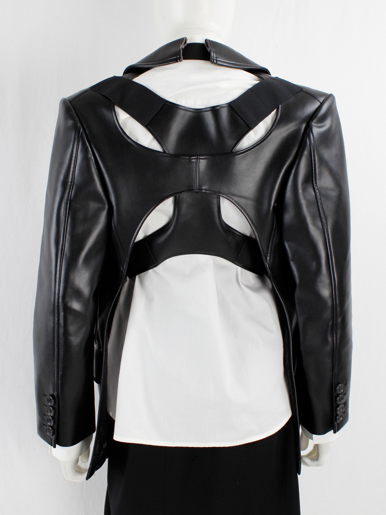 Junya Watanabe black faux-leather backless blazer with belted 