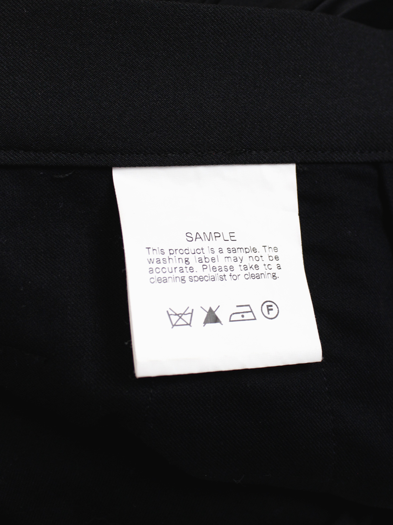 Chika Kisada black tailored pants with accordeon pleated half