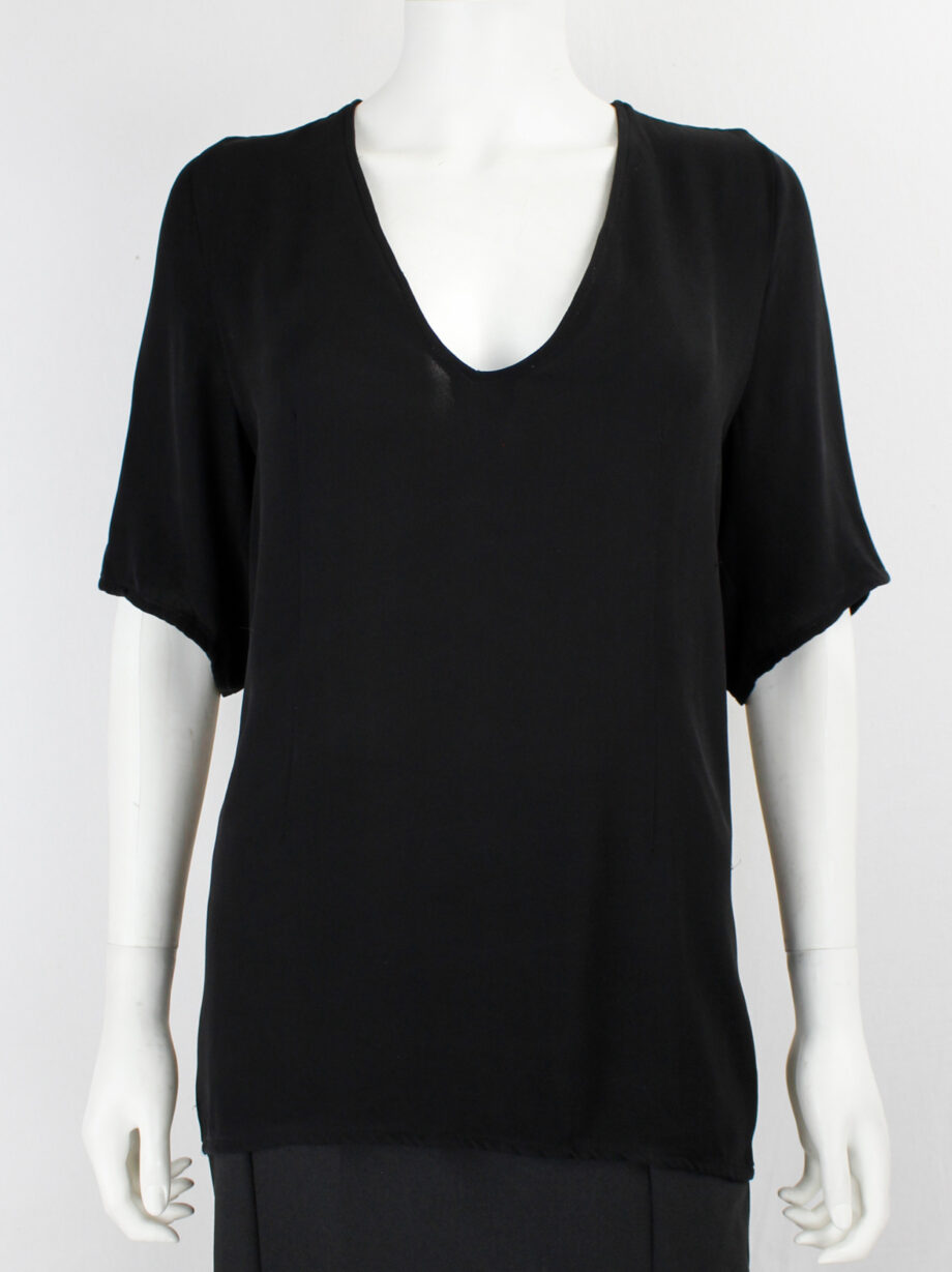 A.F. Vandevorst black long top with horse saddle-shaped back seams
