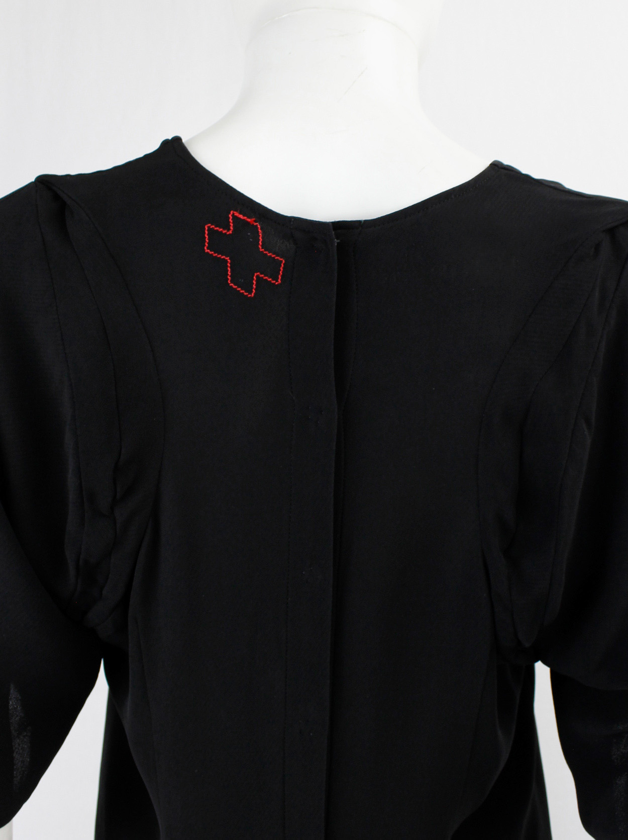 A.F. Vandevorst black long top with horse saddle-shaped back seams