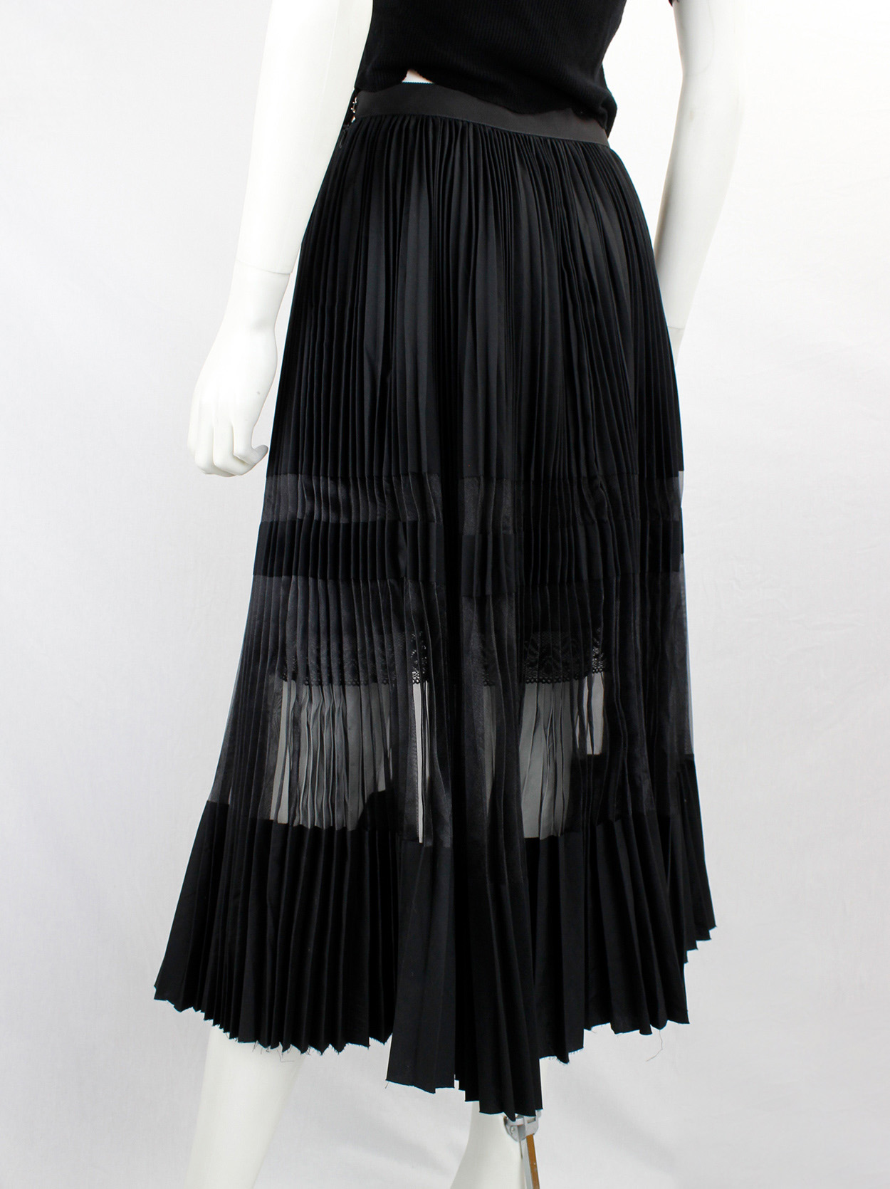 Sacai black open front pleated skirt with sheer inserts and lace