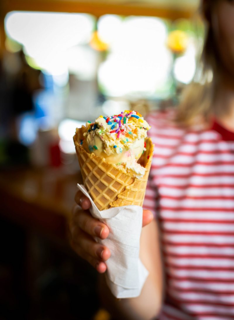 Island Queen ice cream cone with sprinkles.