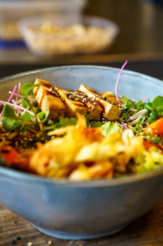 Vegan ramen maincourse with marinated tofu and seaweed at vegane glorie