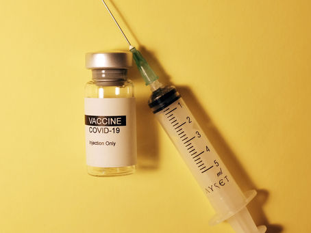 covid-19 vaccin och spruta