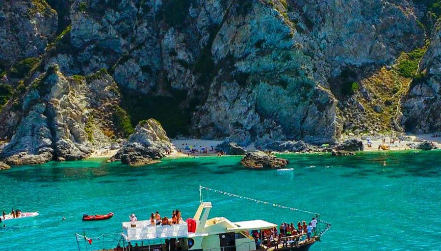 Dramatic Mediterranean granite cliffs and turquoise sea of Capo Vaticano, Calabria