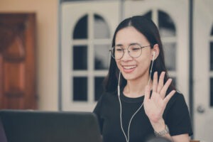 Woman working from home video conference.