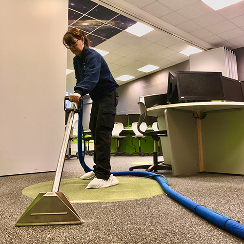 commercial carpet cleaning in a school, Telford. Grey carpet