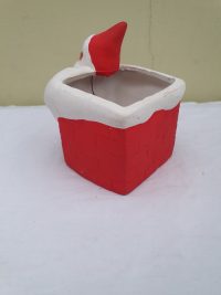 Keramik skorstenspotte med julemand.