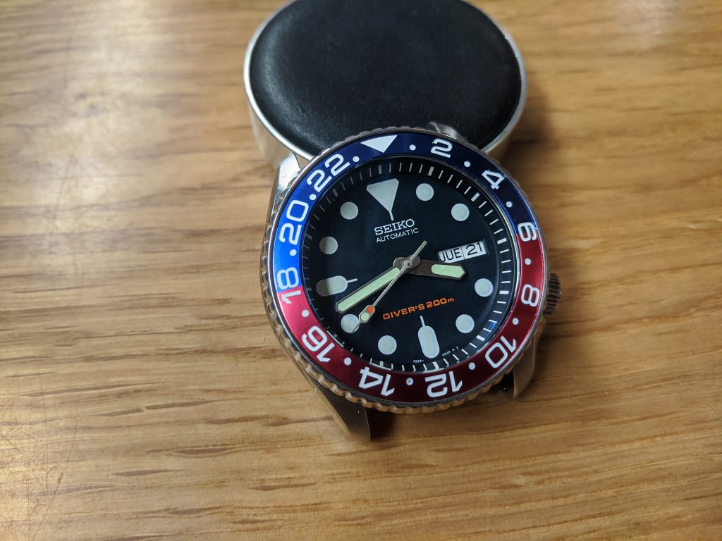 Seiko SKX009 GMT Pepsi Mod: DD  Sapphire sloped ceramic GMT pepsi. Modified  Marine Master style hands 