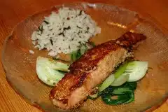 Dinner plate with salmon, pak choi and wild rice