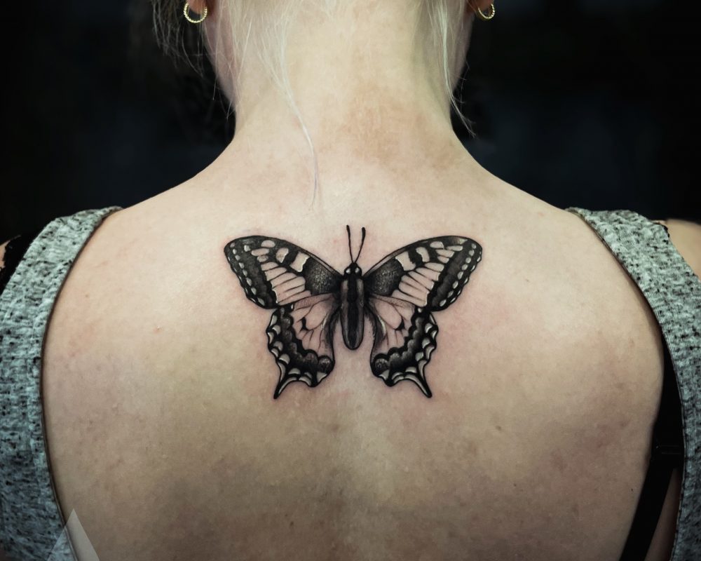 Realistic butterfly tattoo