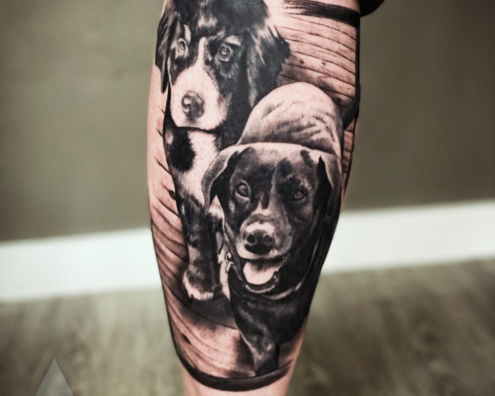 Realistic dog portrait leg tattoo piece