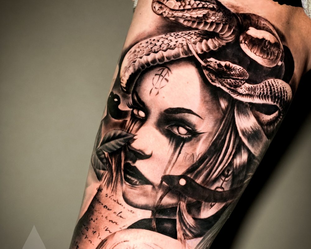 Graphical realism modern Medusa custom design leg tattoo piece