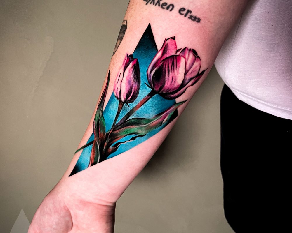 Realistic tulips colour tattoo arm piece