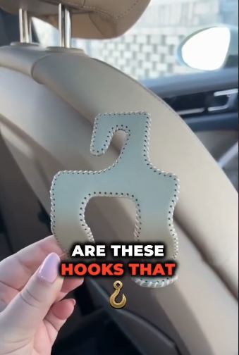 The clever hook gives drivers a new way to store items in their motor while also creating more space