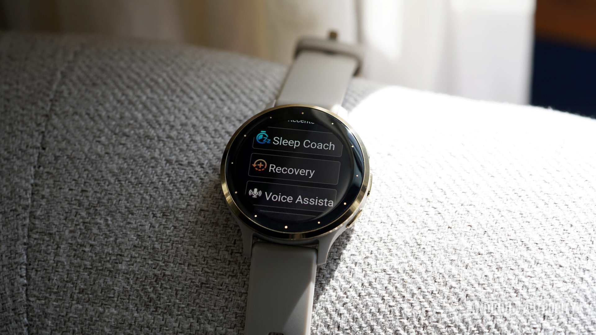 A Garmin Venu 3 displays a user's Recents menu, including Sleep Coach Recovery and Recovery widgets.