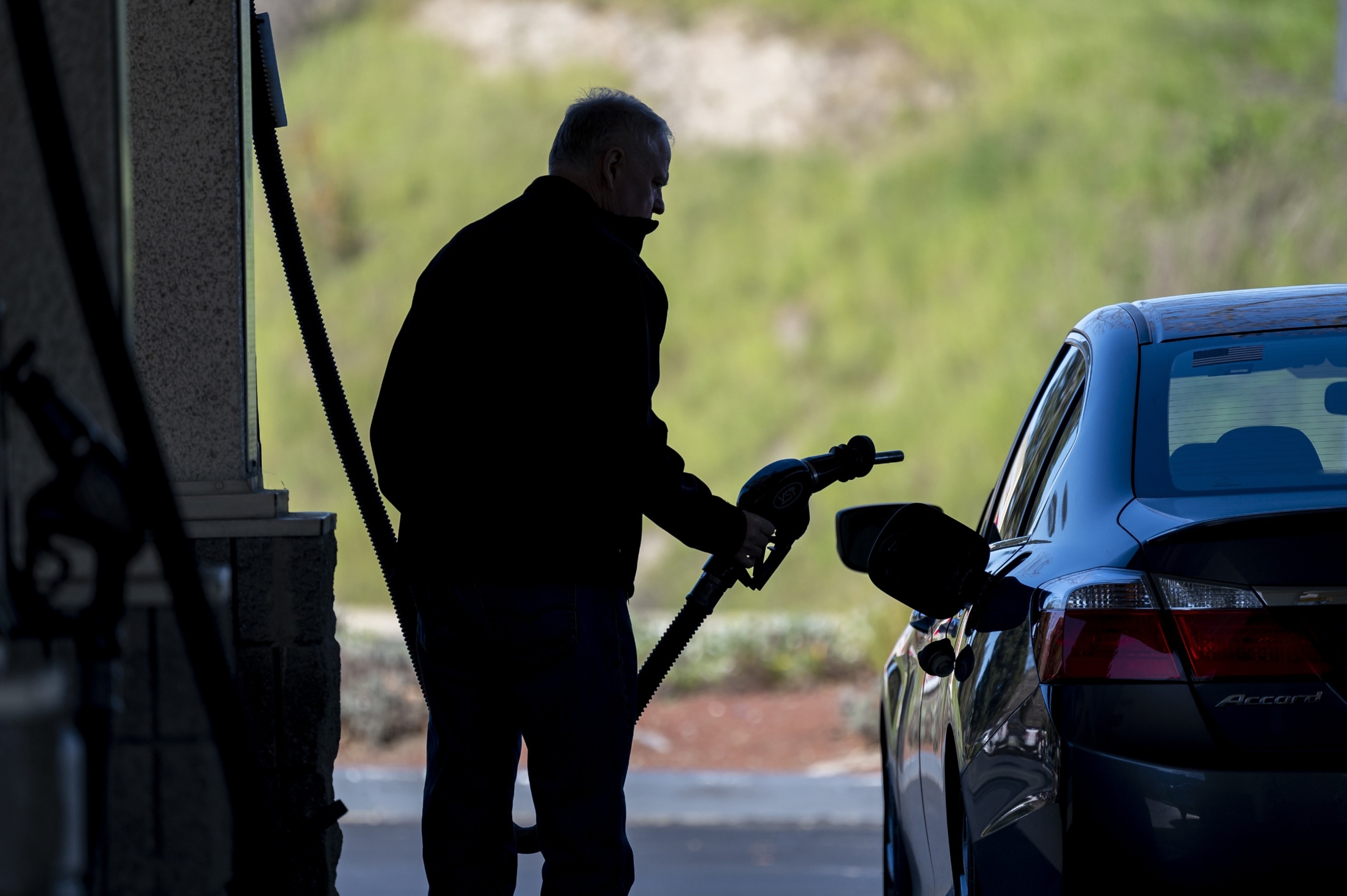 PHOTO: A customer pumps gas at a gas station in Hercules, Calif., March 14, 2024. 