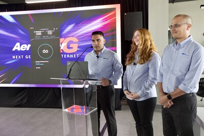 Gino Villarini, founder and president of AeroNet, performs a speed test of the new AeroFiberXG with Teremarih Rivera, Account Executive, and Luis Cintrón, Senior Network Engineer.